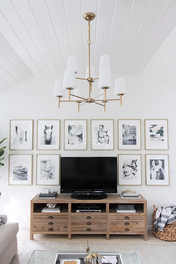 How to decorate around a TV: try a grid gallery wall! Come see all sorts of ideas and inspiration in this blog post!