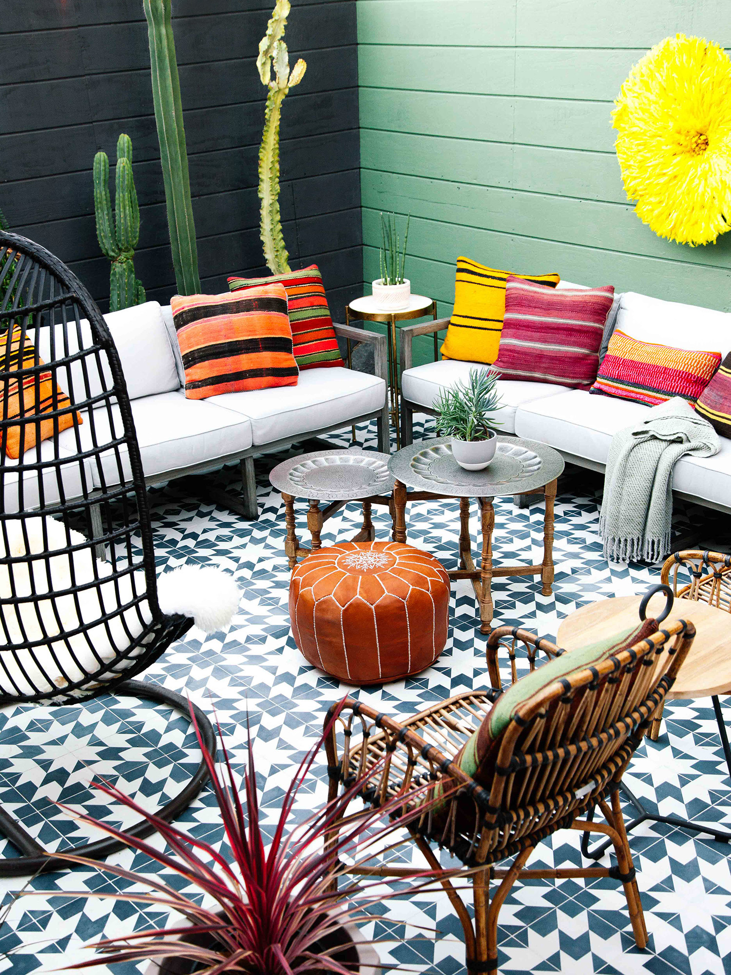Old Brand New's eclectic boho outdoor patio makeover from the One Room Challenge (Fall 2017). I love the bright colors, planked walls, and Moroccan inspired tile!