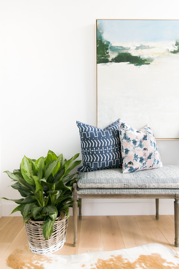 Inspiration for Mix & Match Design Company's One Room Challenge (Spring 2018). I'm loving the mix of styles, the blue and green color scheme, and that large abstract landscape painting.