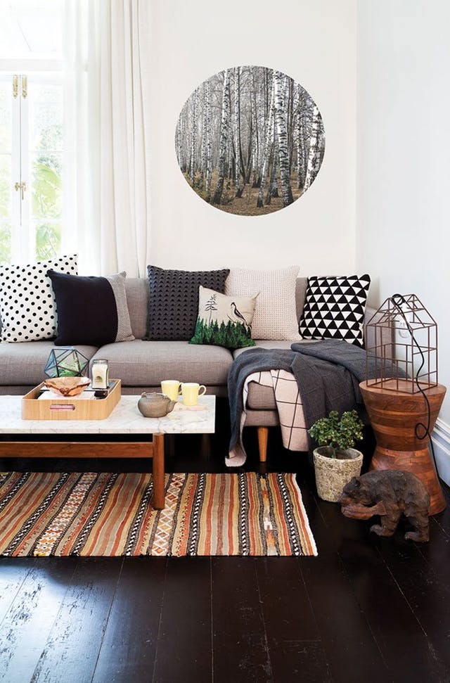 Inspiration for a mountain modern living room. Love the tribal, mid-century, and rustic touches.