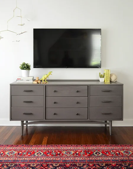 Use a dresser as a media cabinet under a TV to add extra storage. Want more design ideas for small spaces? Head to the Mix & Match blog!