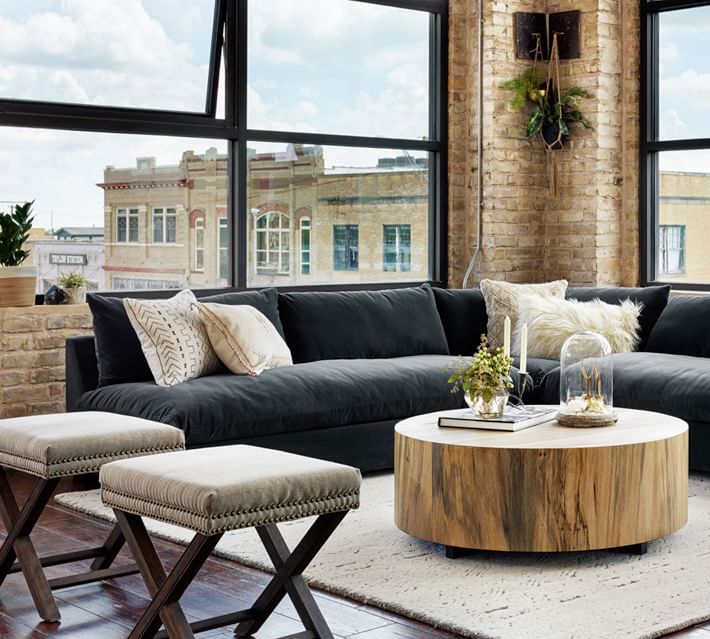 Use benches or stool ottomans as extra seating, and store them away under a console table or use them as a coffee table when they aren't needed. Want more design ideas for small spaces? Head to the Mix & Match blog!