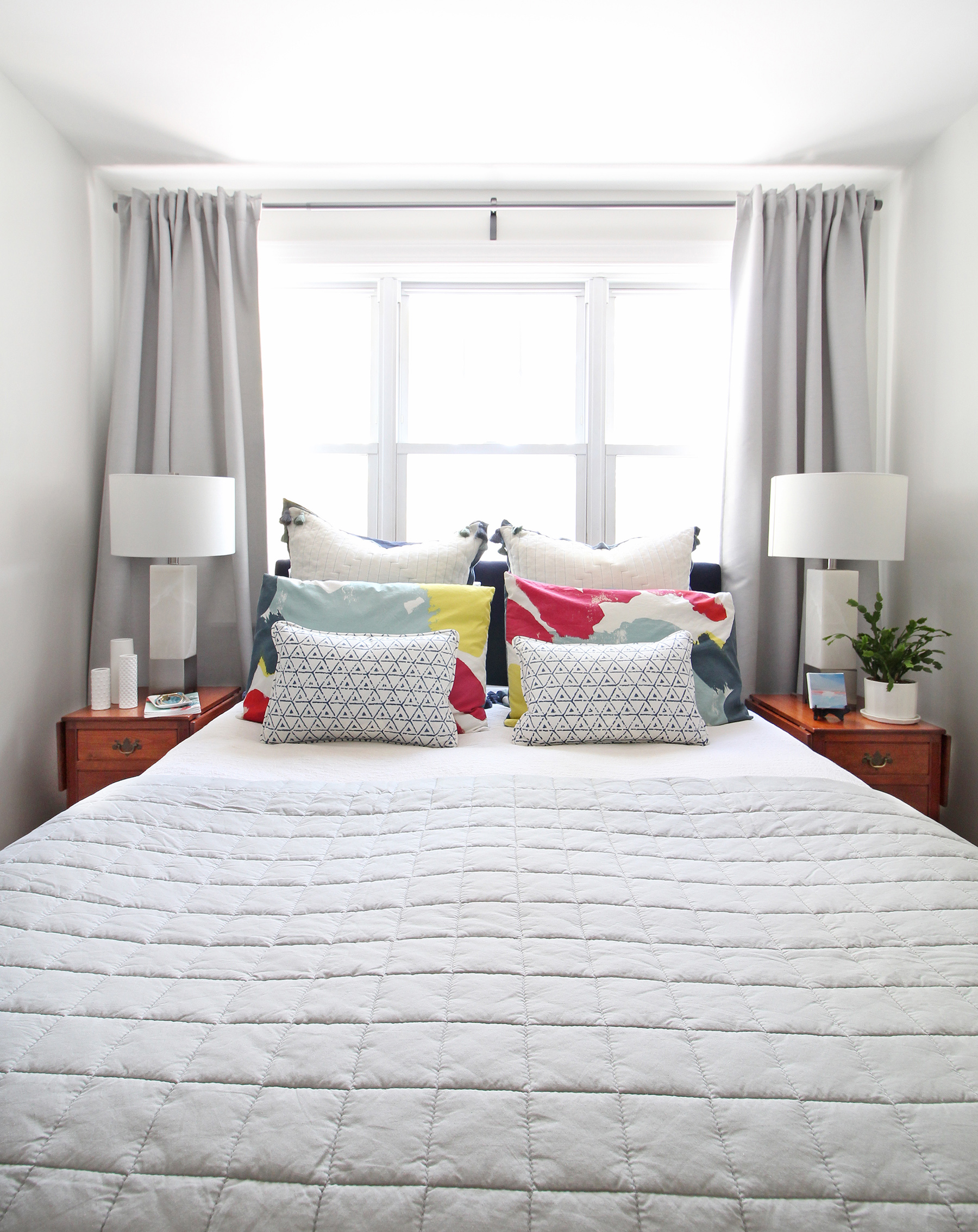 Head to the blog to check out Mix & Match Design Company’s mini refresh of her eclectic modern master bedroom. A gray linen quilt works beautifully with her tasseled euro shams, watercolor shams, and blue and white lumbar pillows.
