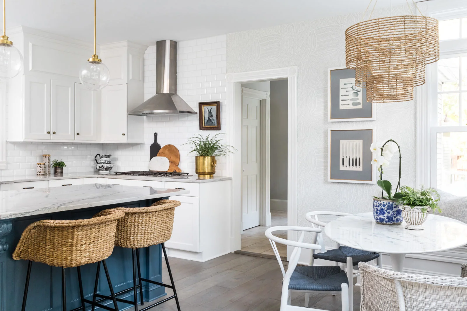 One Room Challenge Fall 2018 | This coastal modern kitchen hits all the right notes with its white and navy cabinets, breakfast nook, and modern lighting.