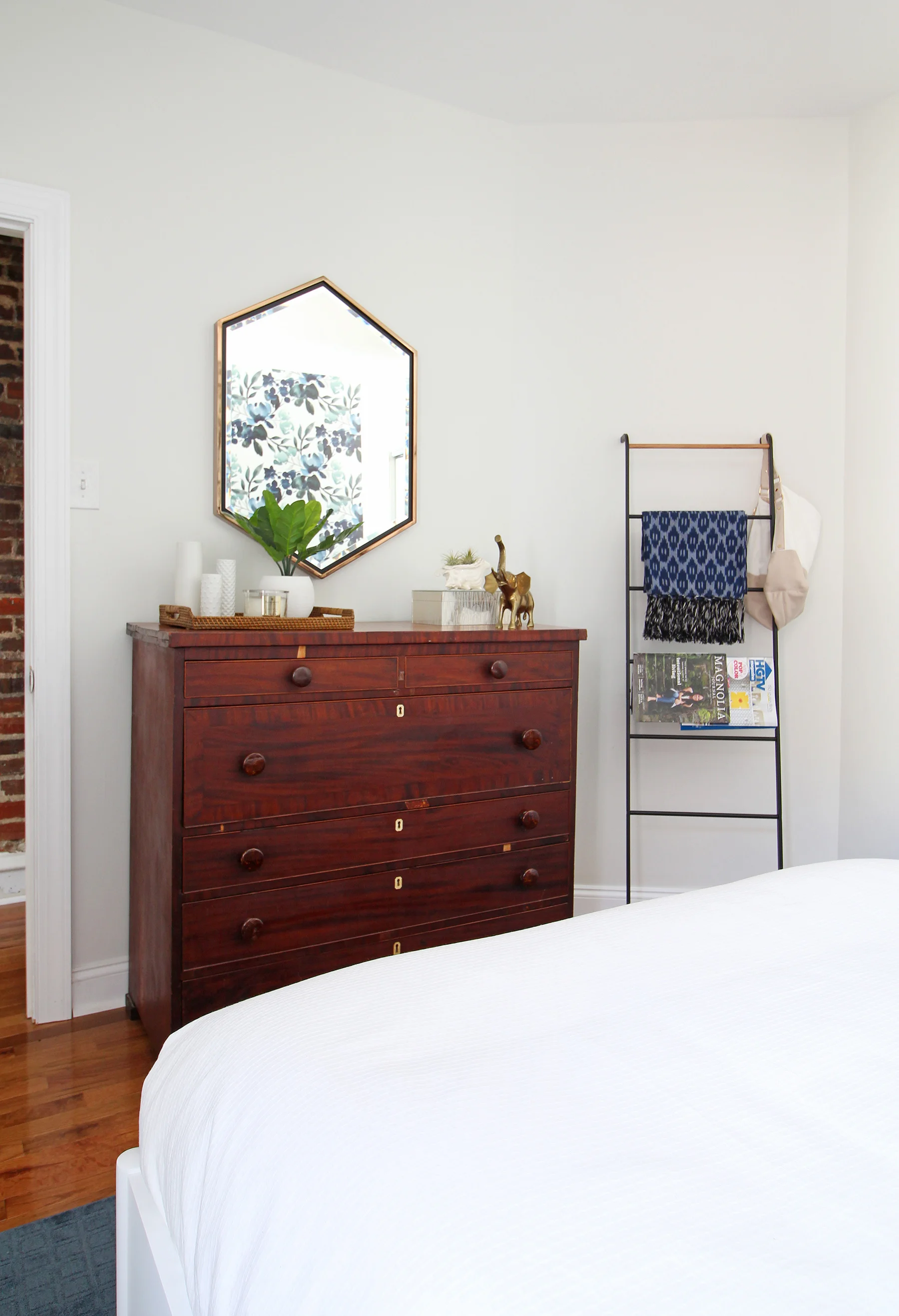 A 1930s row home in Philadelphia gets a big makeover. Come see the before and after of this home’s bedrooms, small bathroom, and office/nursery nook. Get ideas for small space city living! Chaney’s style is mid-century modern meets traditional that makes for an eclectic, cozy space.