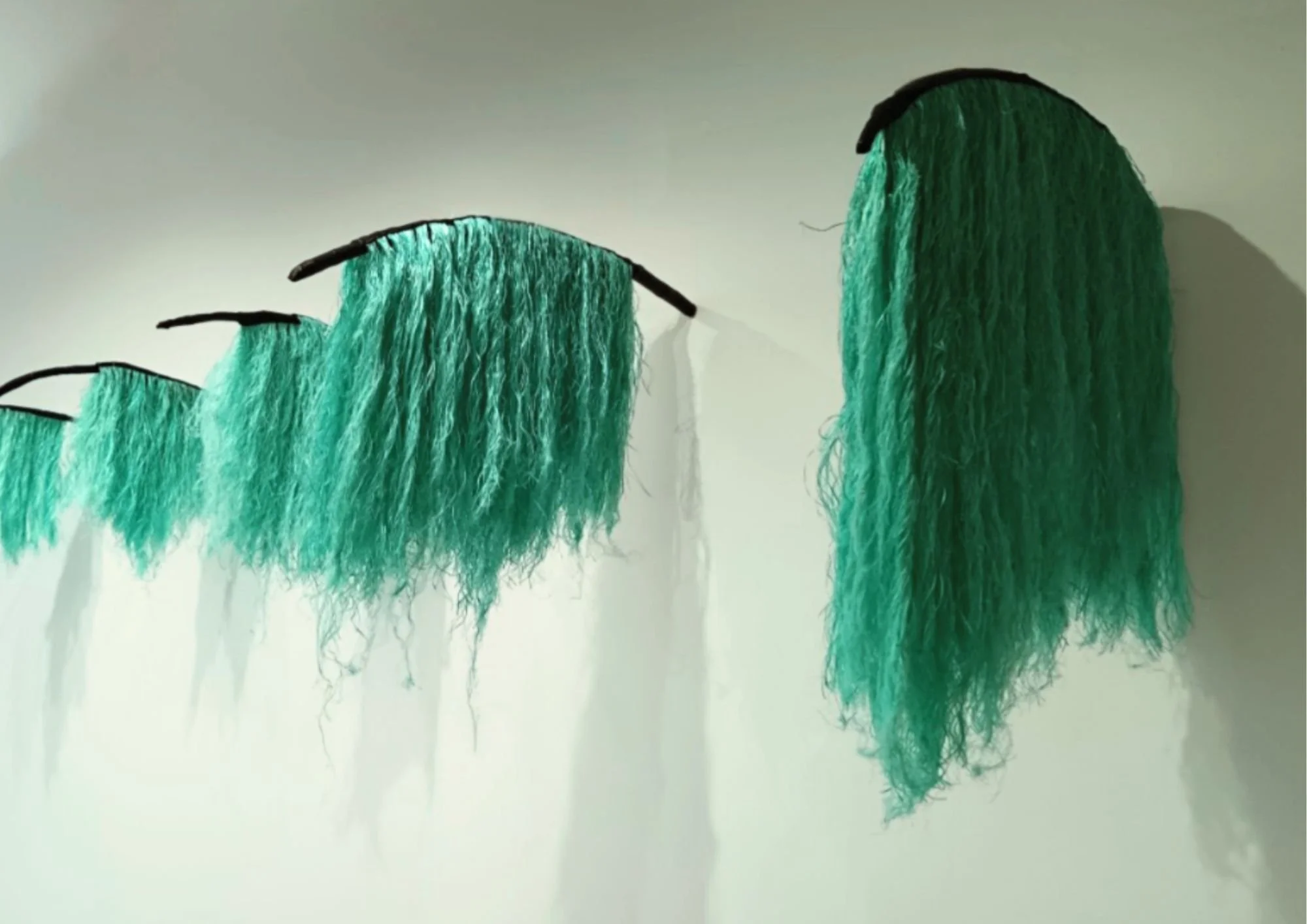   OUTO ALALAJI / STRANGE SUBSPECIES   2026  nahka, puu, nylon köysi / leather, wood, nylon rope  