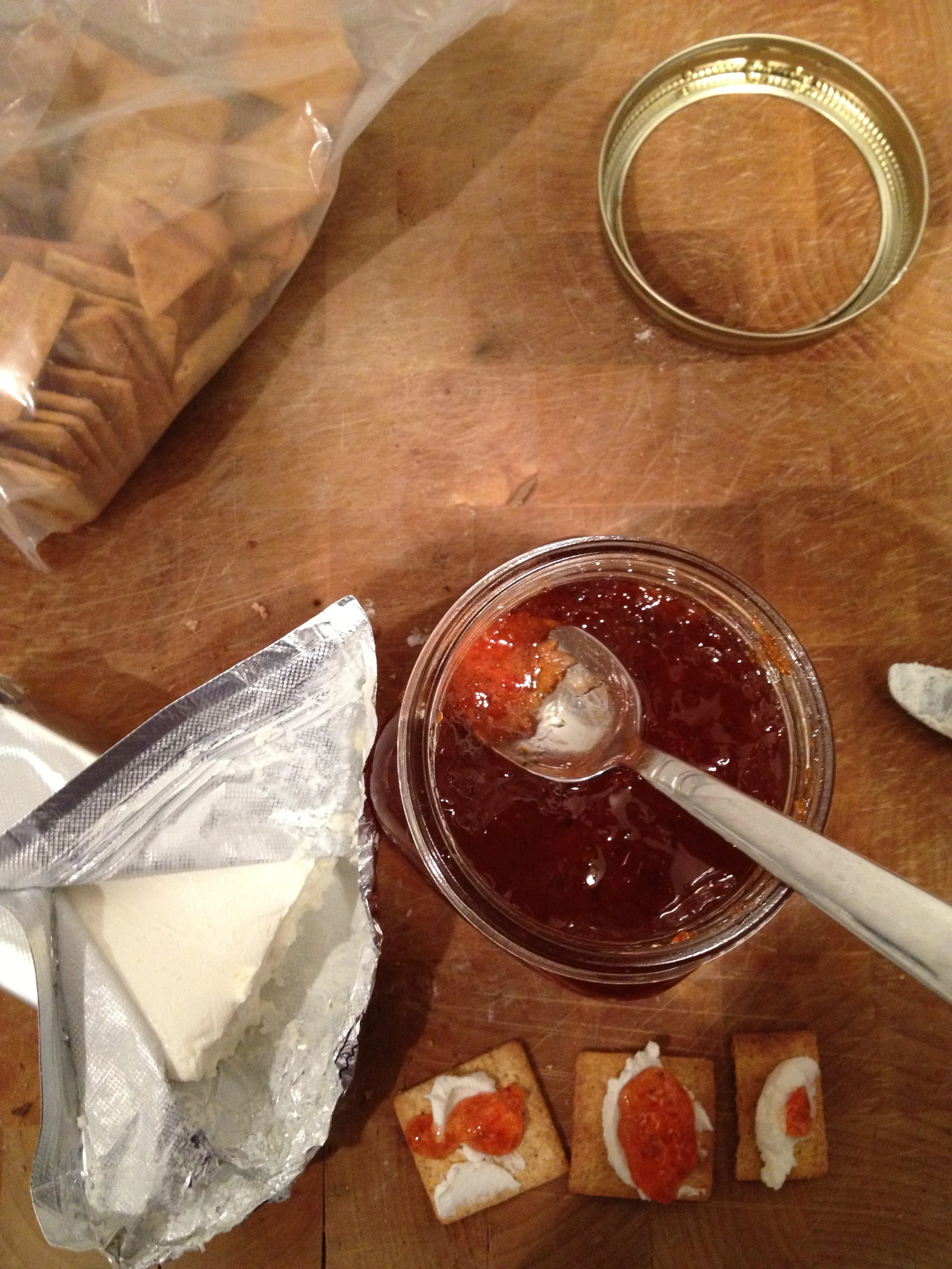 Hot pepper jelly from garden with cream cheese and wheat thins. 