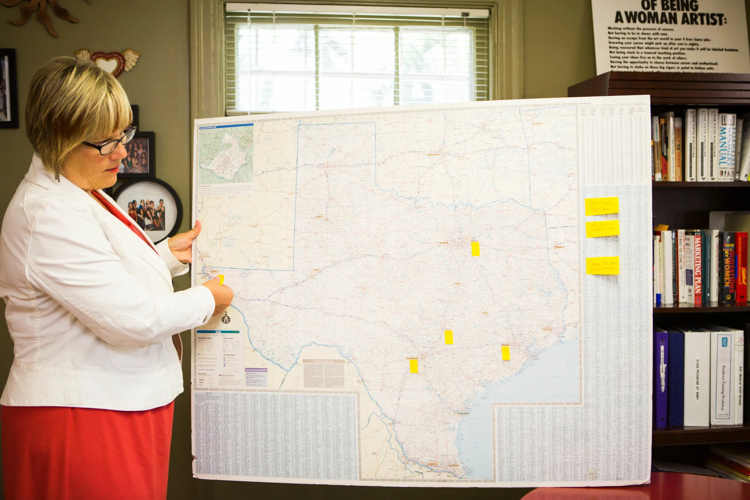  Amy Hagstrom Miller holds a map of the remaining Texas clinics. 
