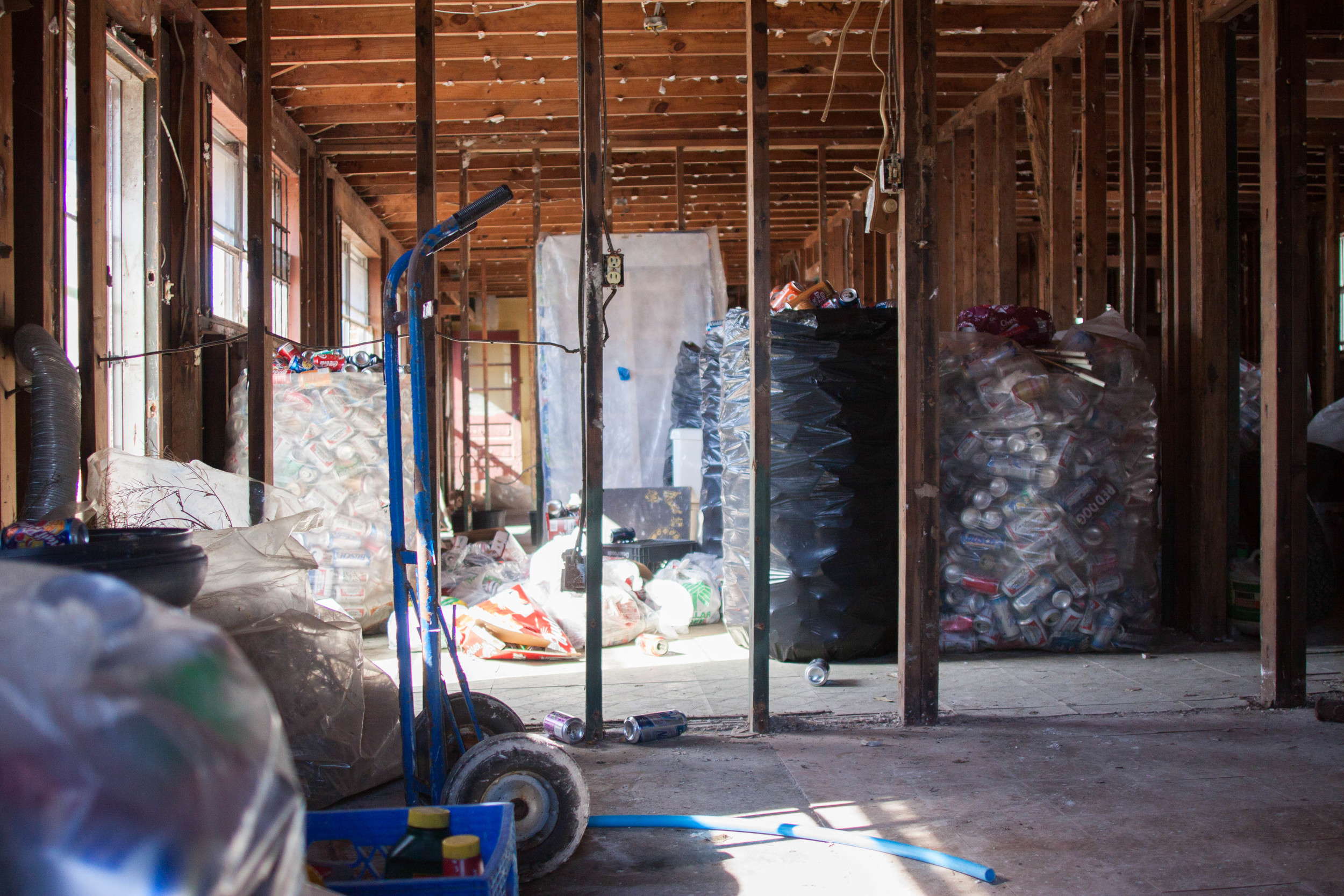  Homeowner Earnest Hammond collects cans to pay for the renovations to his home 