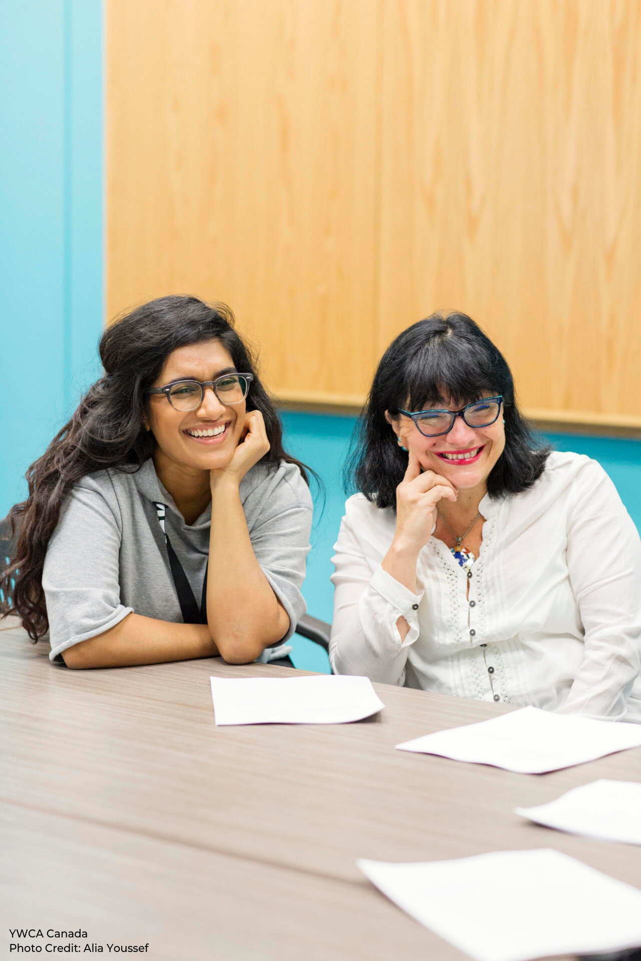 Smiling women at a table.jpg