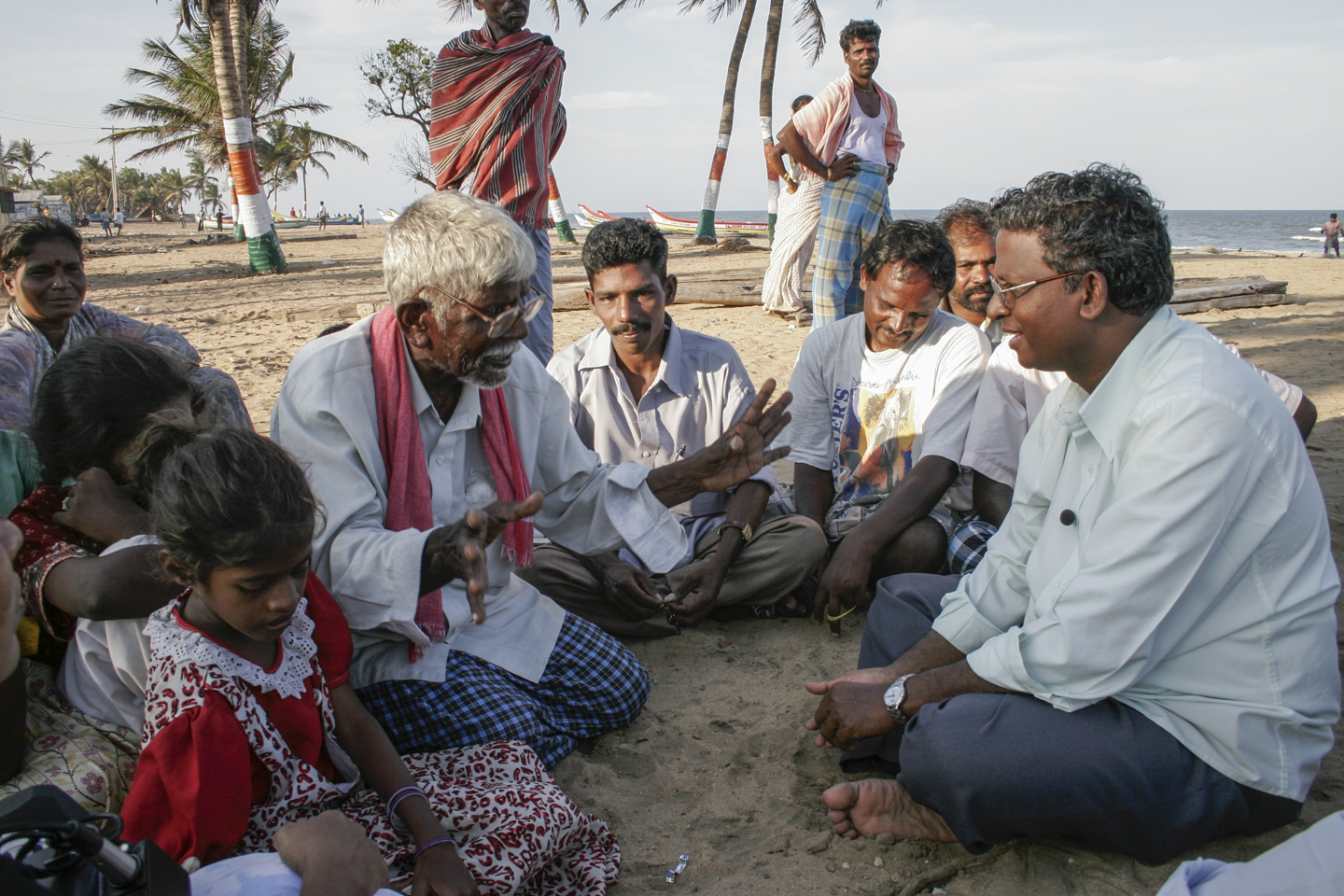 Fr. Jesumarian, S.J. meets with a group of villagers affected by the tsunami. He is a lawyer who has led a crusade to combat discrimination against India's Dalits, formerly called "untouchables," the lowest Hindu Caste.