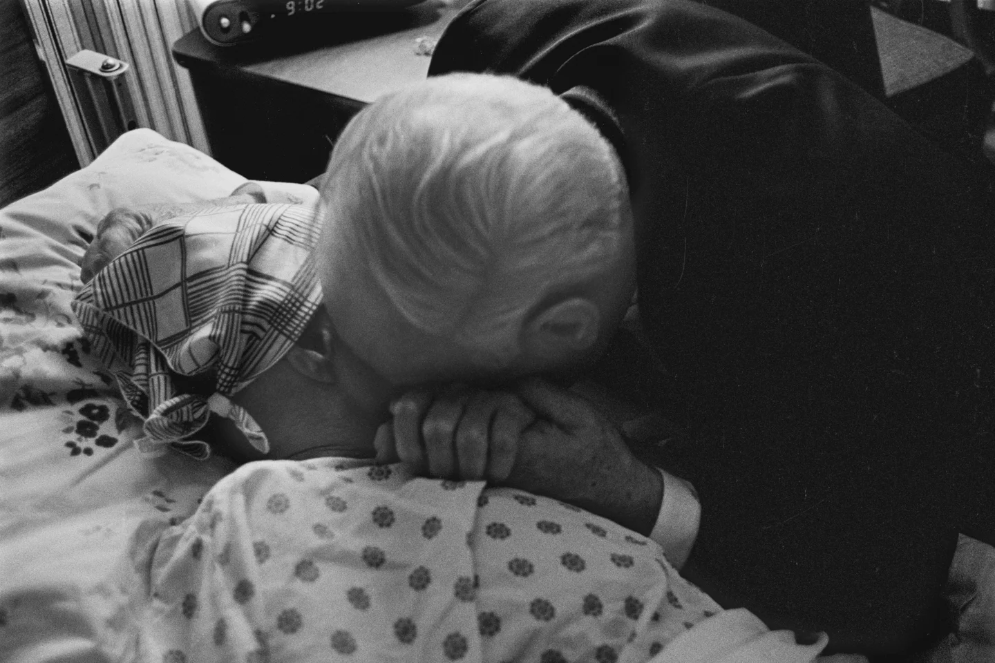 My father saying good-bye to my mother for what he thinks is the last time. Due to her irregular breathing, the hospice staff thought the end was near.