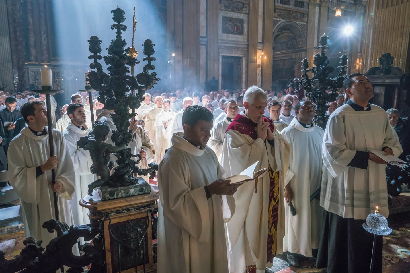At the end of the mass at the Gesu, Fr. Arturo Sosa, SJprays before the tomb of St. Ignatius.