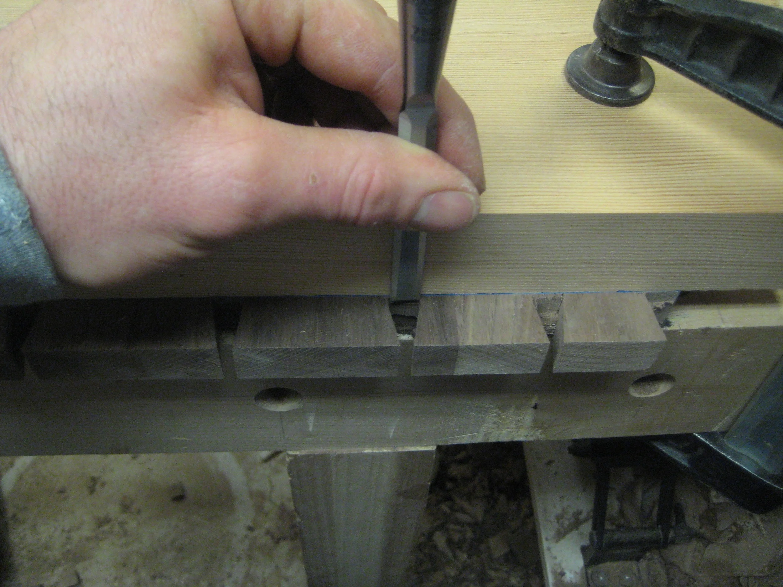 Next to get a nice straight baseline for the tails I chop out the rest of the waste material with a chisel. I use a square piece of wood as a guide to keep the chisel square and plumb.... #trusttheblock