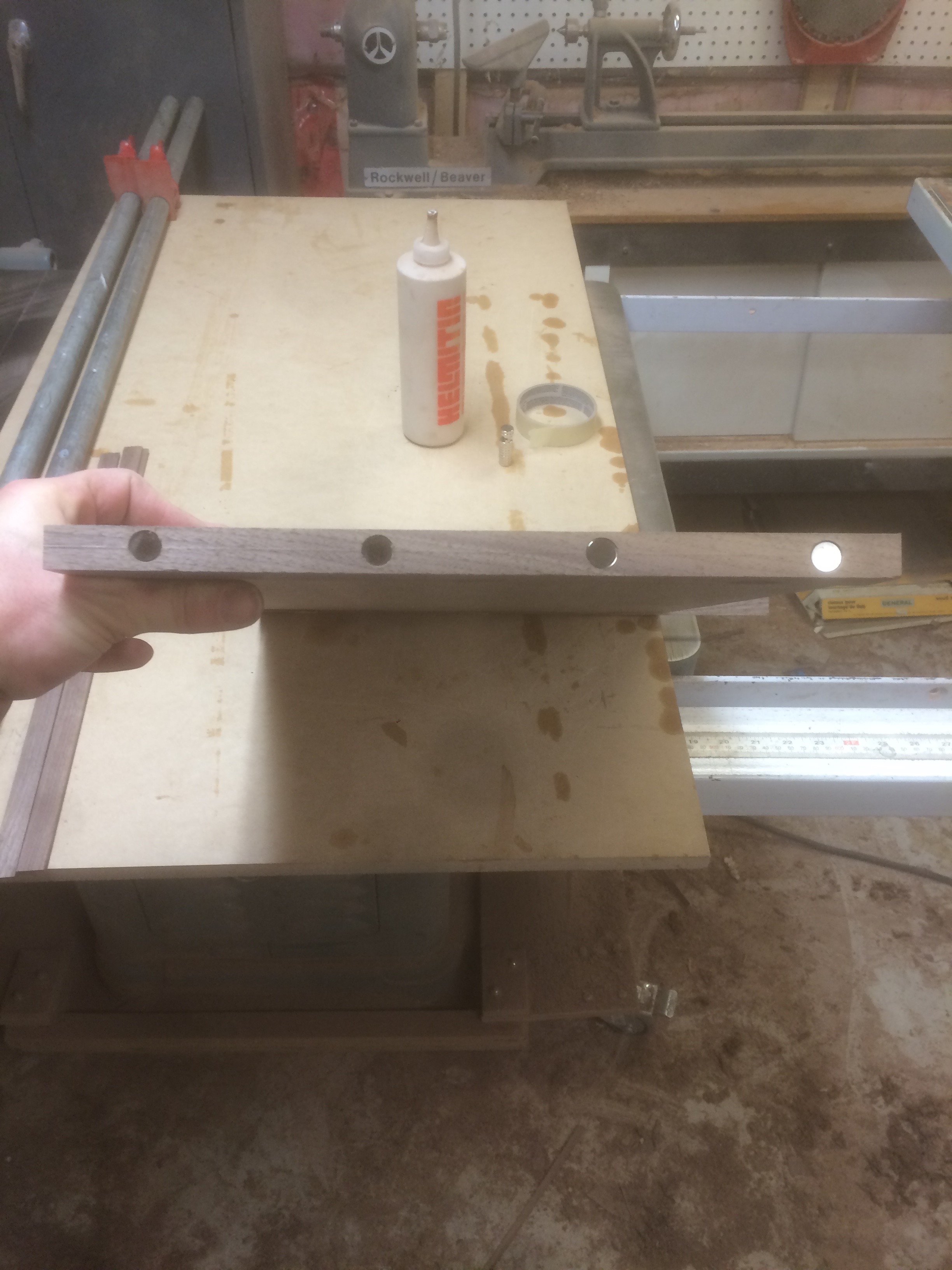 Magnets embedded in the dividers of the case.
