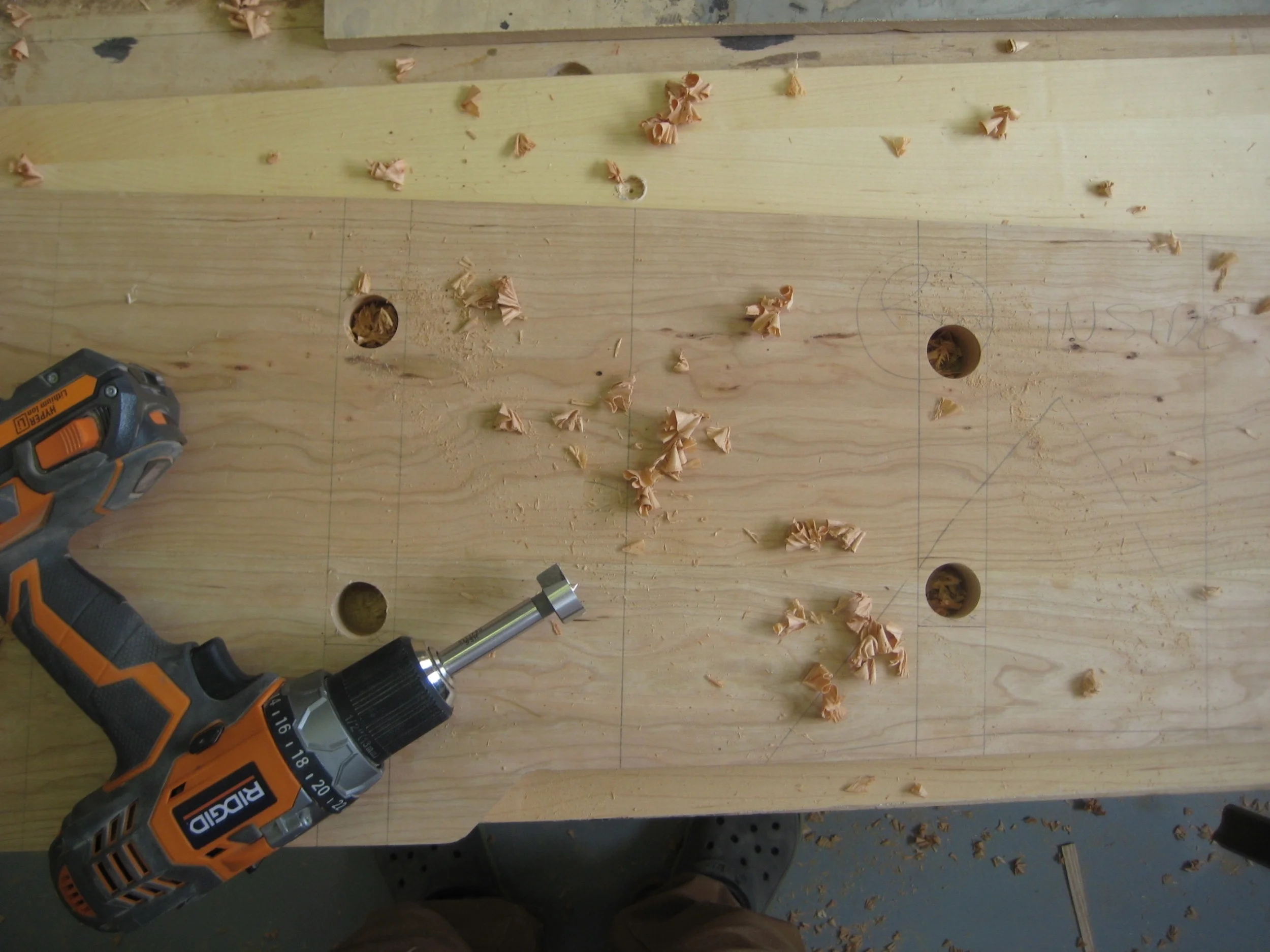 First I hogged out the waste with a drill so that the router would not have to do all he work.