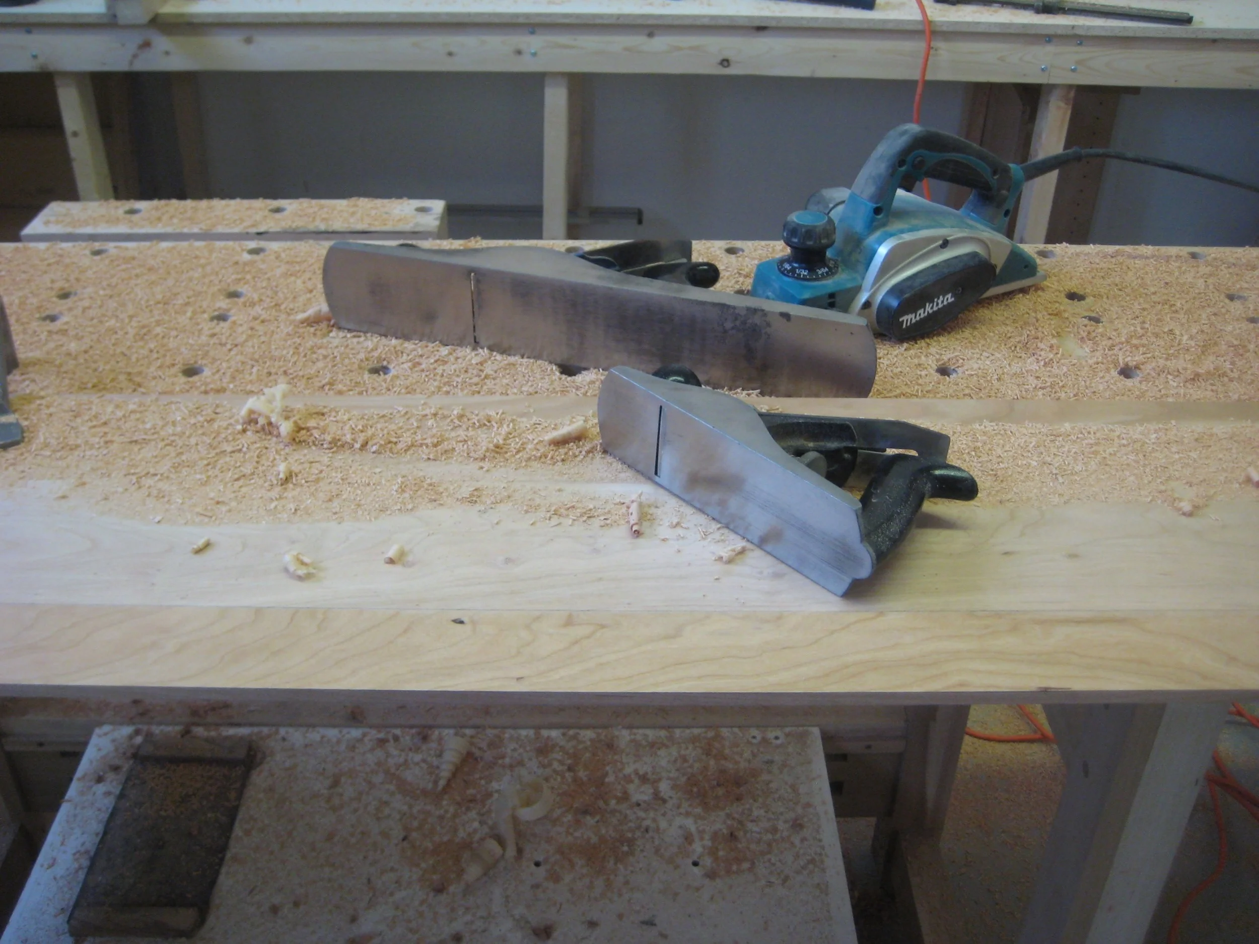 Here I started by laying out the bevel, and then using the power plane, my big No. 8 jointing plane and my No.4 smoother to finish the job