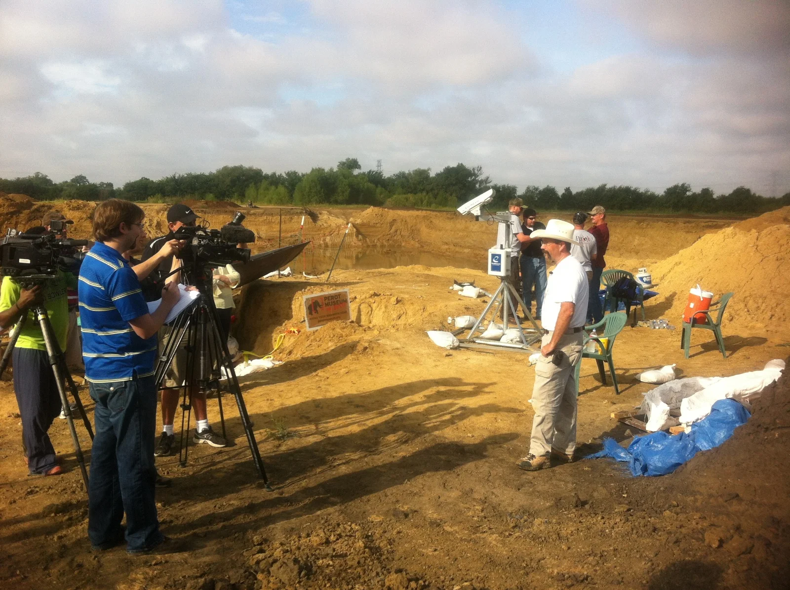 Local and National News Stations at the Dig Site 