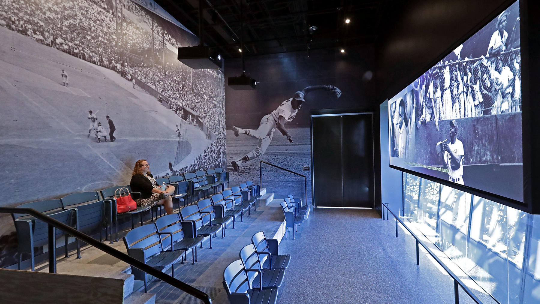 BASEBALL THEATER. The chairs in this theater and recreated from a Negro League stadium – Negro Leagues were among the most important businesses in black America during the first half of the 20th century. Photo credit: Chip Somodevilla / Getty Images