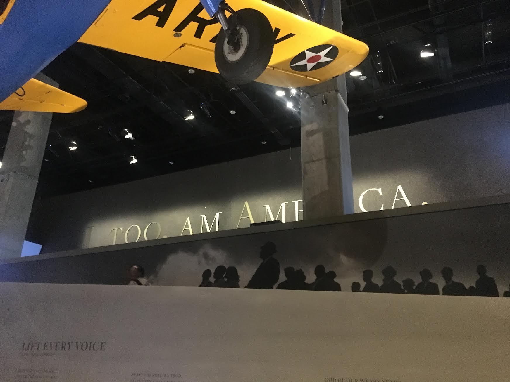 I, TOO, AM AMERICA. As you exit out of the History galleries, you pass by a Langston Hughes poem excerpt in giant brass letters. Photo credit: Aki Carpenter