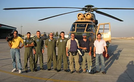 Abu group posing by chopper.jpg