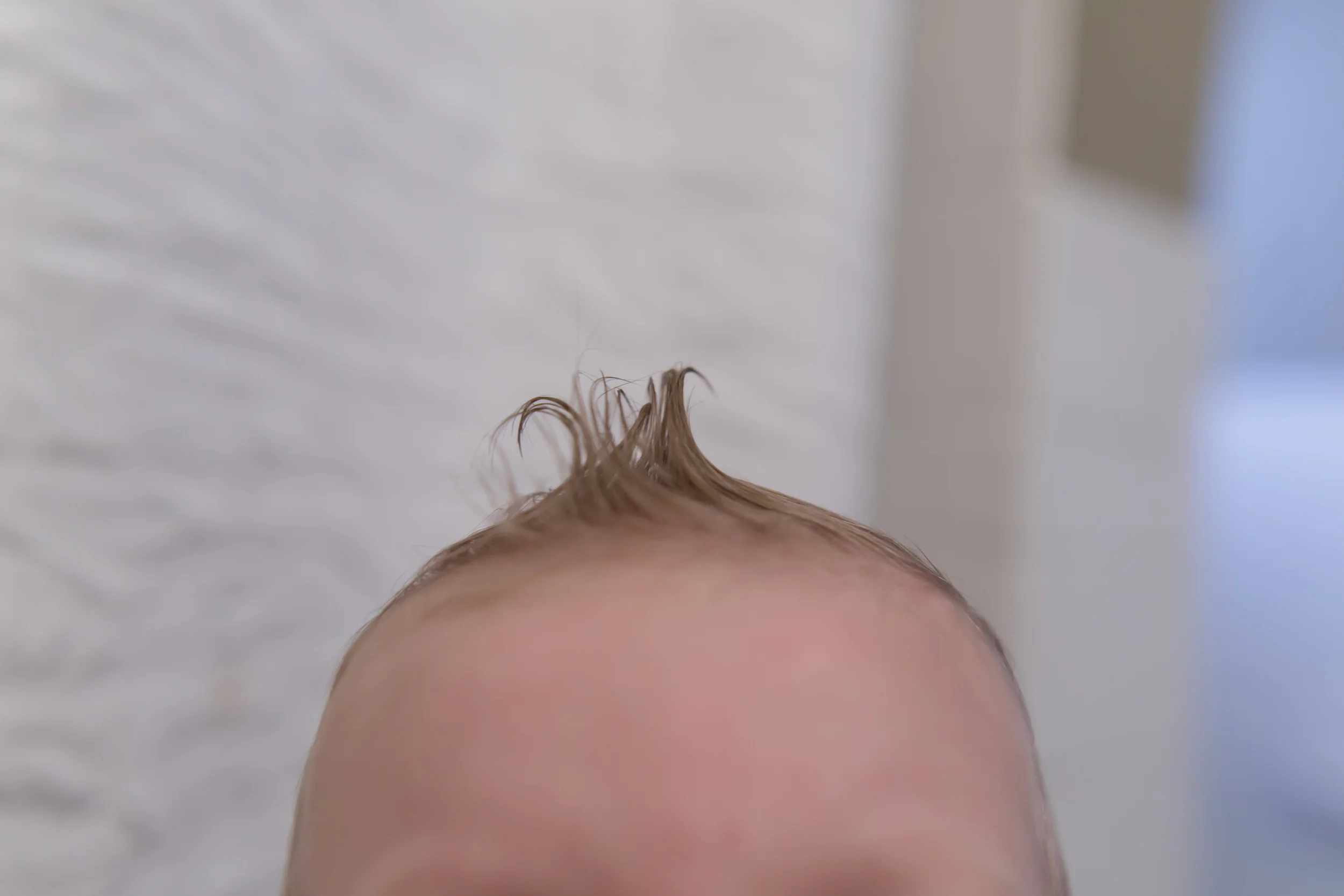 More details. Curly Q.