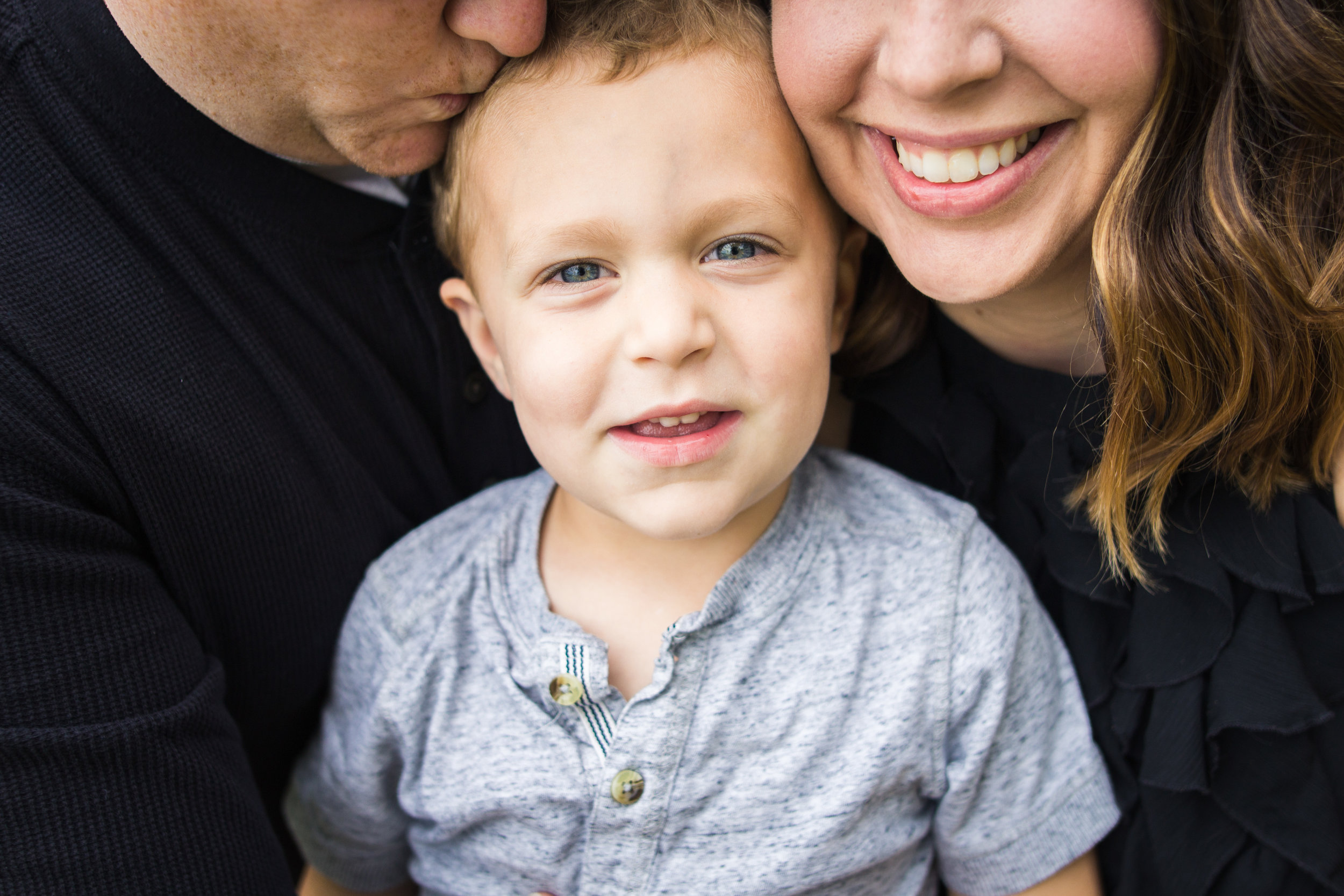 Close up shot of immediate family during photos