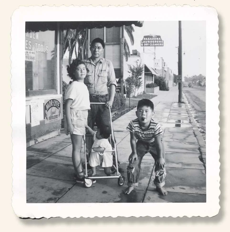 Storefront and Uncle Frank posing with his kids Betty, David, and Sharon. 1953. (Click to enlarge.)