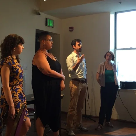 Fellows present action plans at the Race & Equity Celebration. From left: Jen Schachter , Charlotte James , David Rodwin and Sarah MacFadden .