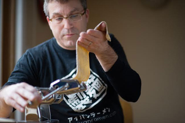 Ivan making noods, photo courtesy of The Atlantic