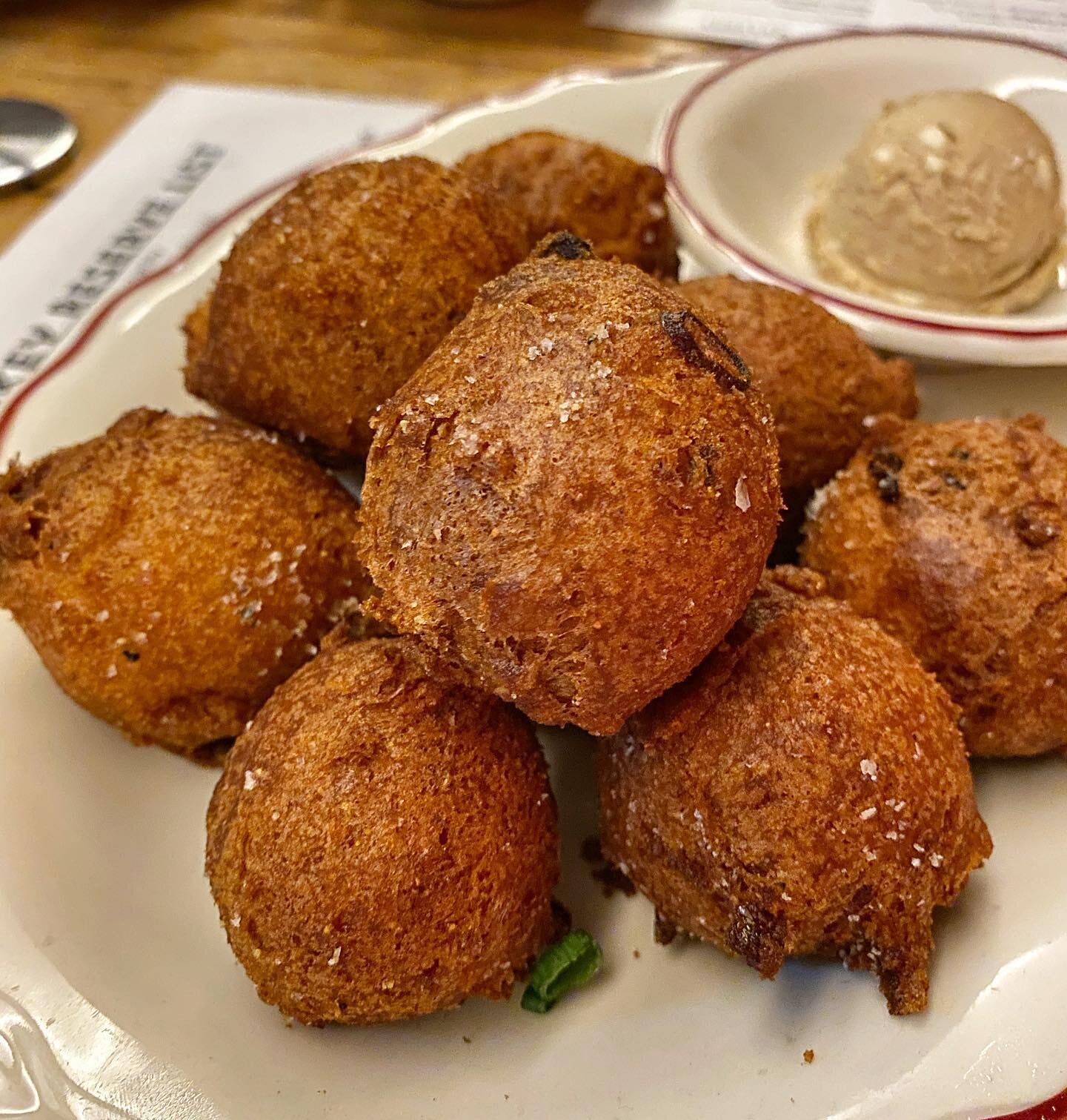 @haberdish hush puppies with sweet tea butter are a Charlotte institution