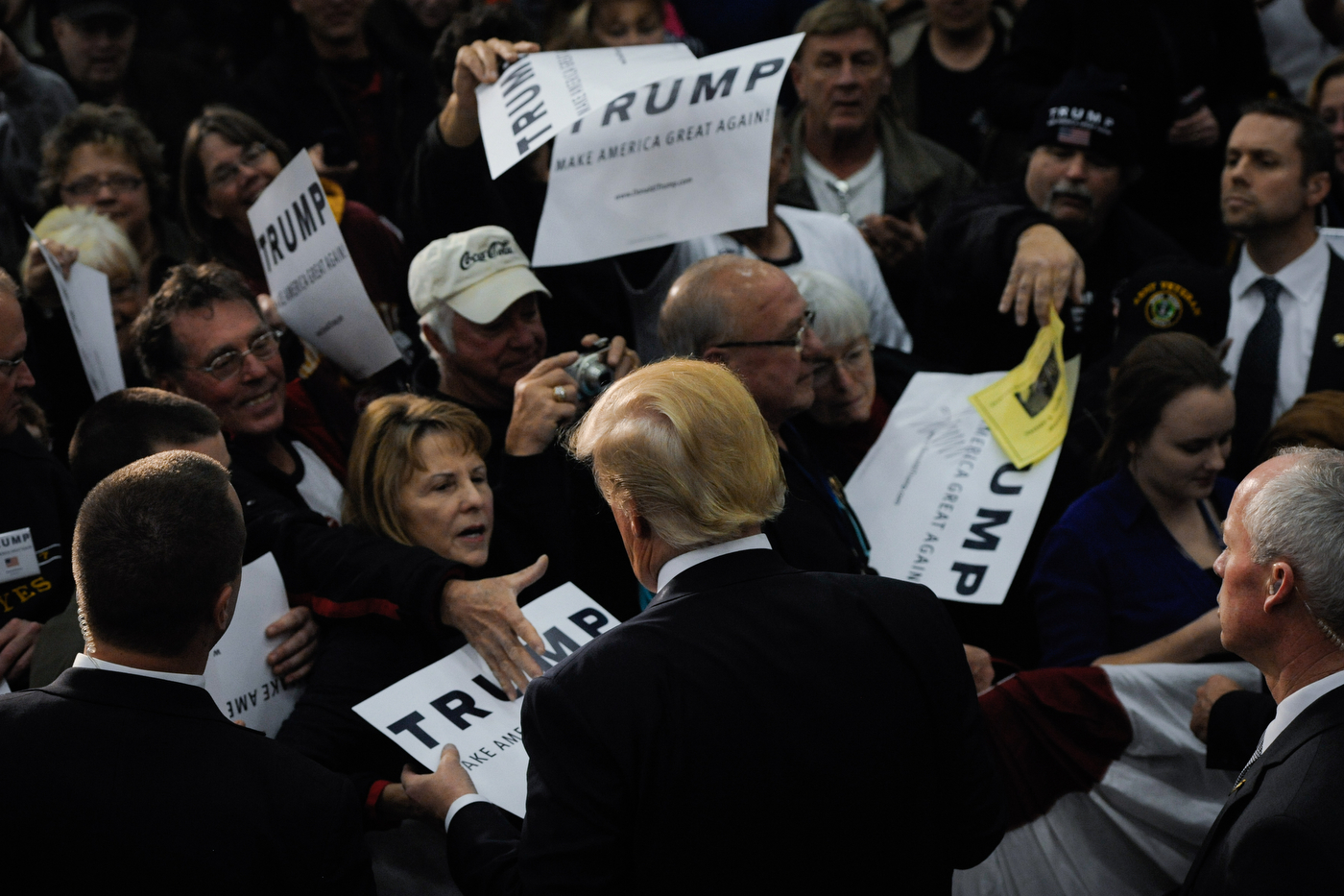  A supporter of Republican U.S. presidential candidate Donald Trump reaches out for a handshake after a rally in Spencer, Iowa on December 5, 2015.  
