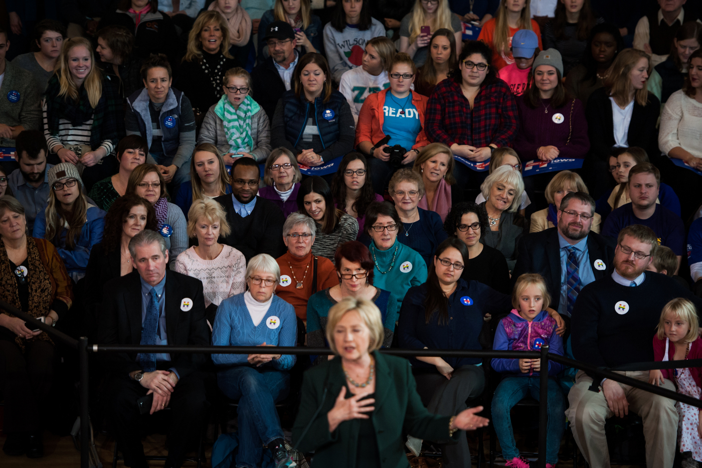  Supporters watch as Democratic U.S. presidential candidate Hillary Clinton speaks during a town hall at Old Brick Church in Iowa City, Iowa on December 16, 2015.  