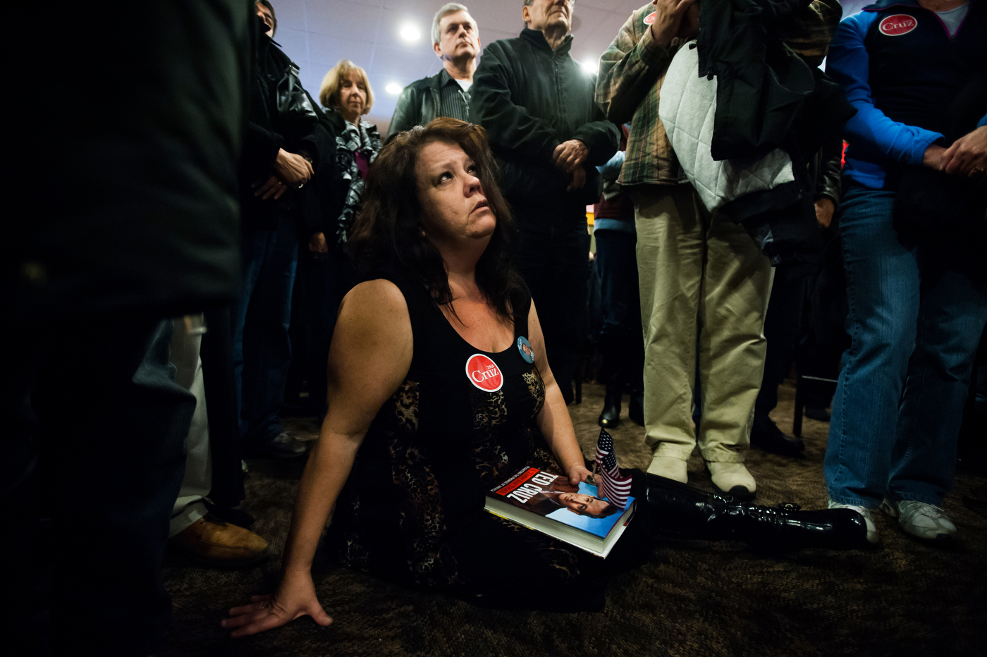  Debra Sage, a supporter of U.S. Republican presidential candidate Ted Cruz, from Grinnell, Iowa listens as Cruz speaks at a campaign stop at a Pizza Ranch restaurant in Newton, Iowa on November 29, 2015. 