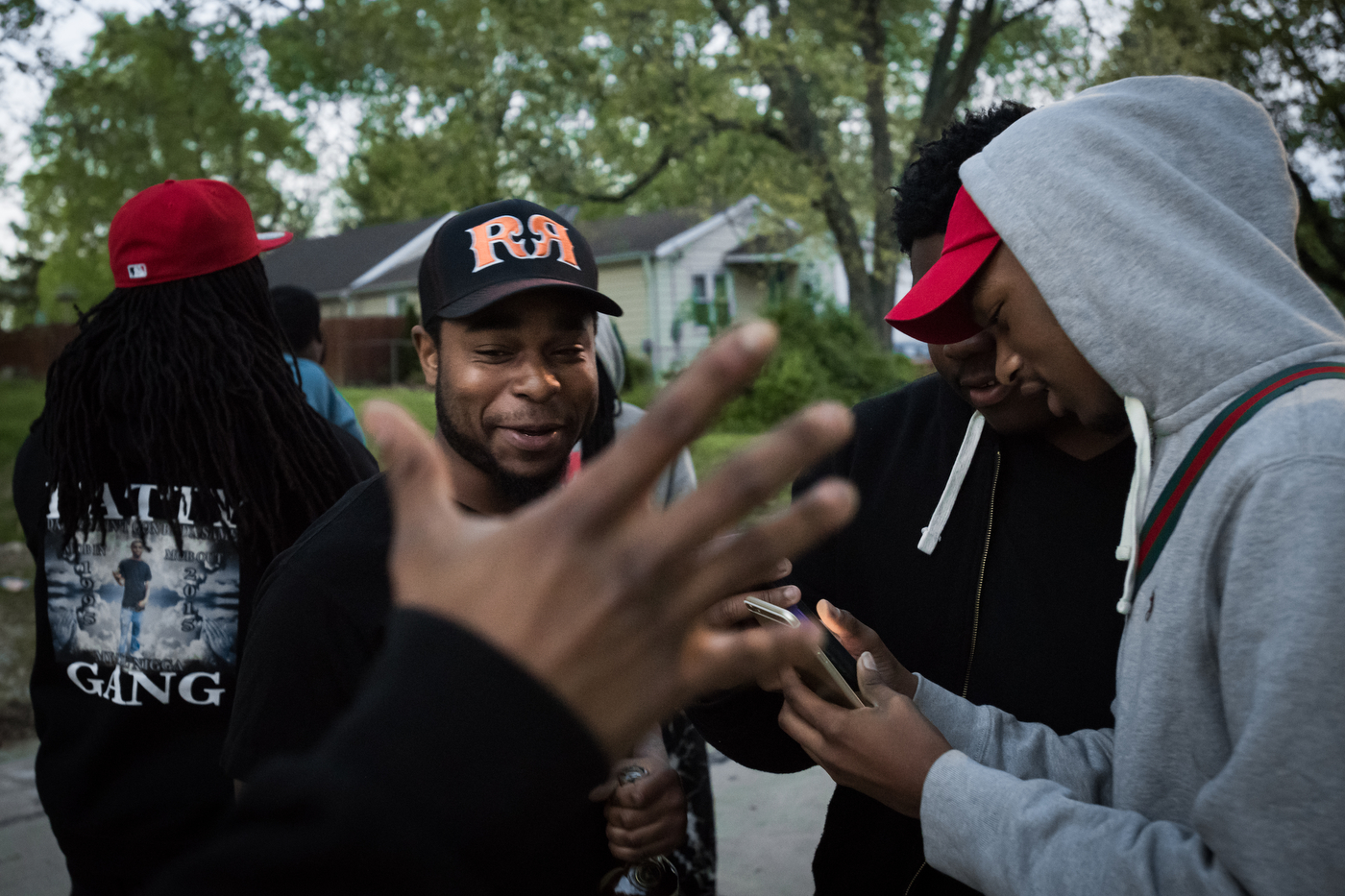 Meech greets a friend while hanging out in the Bermuda neighborhood of Ferguson, Mo. Their group calls themselves Fatty Gang, named after their friend, 20 year-old Antwon "Fatty" Smith, who was shot to death in February, 2015.
