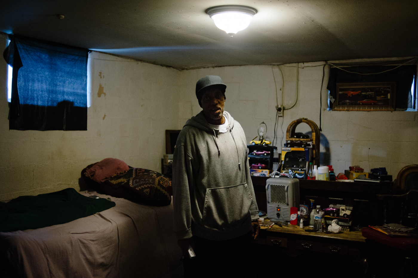 “My Wii and my model cars. That’s what keeps me off the streets,” says Earl Carter in the basement of his home in Ferguson, MO. Formerly addicted to crack, Carter was honorably discharged from the Air Force but has been arrested over 20 times for traffic violations and is currently suing the city over their de facto debtors prisons.