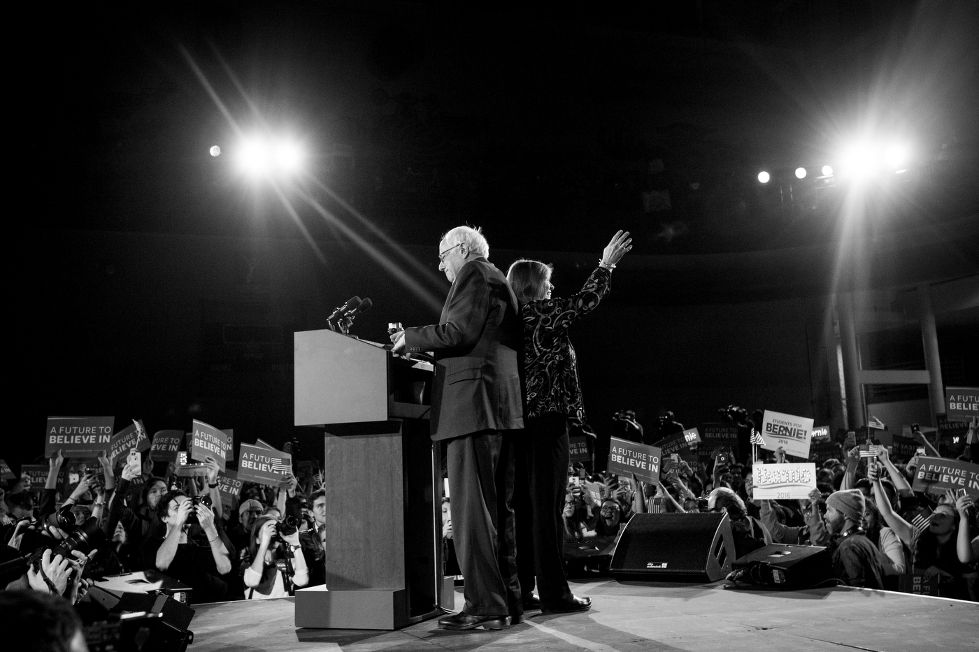  Democratic presidential candidate Bernie Sanders takes the stage as his wife Jane waves to the crowd at a campaign rally and concert at the University of Iowa in Iowa City, Iowa on January 30. Almost 4,000 attended the rally, where bands Foster the 