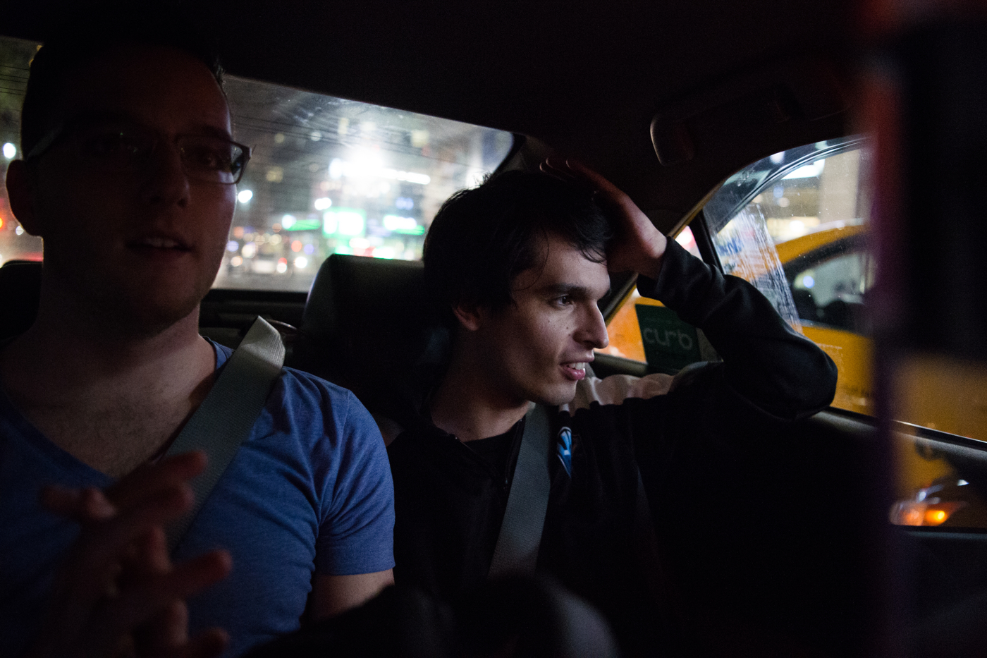  Michael "Veteran" Archer, head analyst for H2k-Gaming, watches passing traffic as he and other teammates take a cab from Madison Square Garden to a late team dinner at Benihana. 