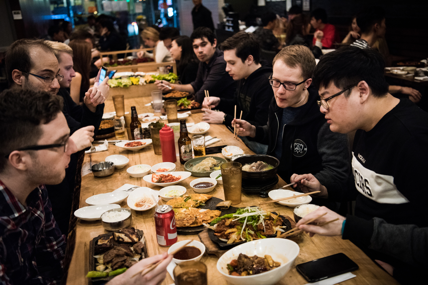  H2k-Gaming team members and staff eat dinner together at their post-match team meal at a Korean barbecue restaurant in New York, NY. This would be one of the last times the team would be together. 