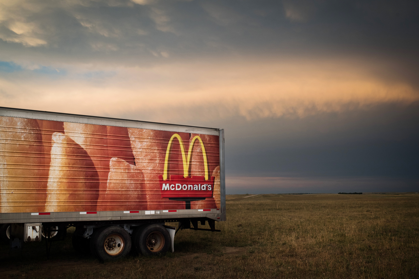  45–31'48.6"N 102º48'17.6"W. 107 miles from the nearest McDonald's. A McDonalds trailer sits in a field outside in the small town of Prairie City, SD on July 31, 2017. Not far from the former McFarthest point in America, a local rancher bought two se