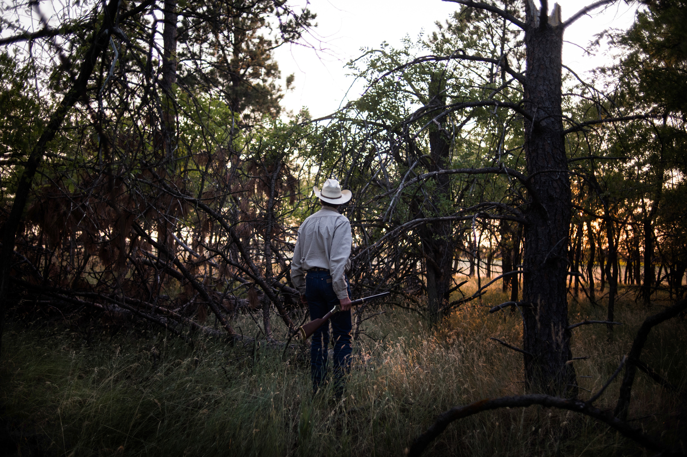  45°31'54.3"N 102°15'32.6"W. 121 miles from the nearest McDonald's.  Kenny Kocer pauses in a clearing of trees as he tracks a skunk he shot on his land in Meadow, SD. Kocer grew up on a local Cheyenne reservation, and despite being far below the bloo