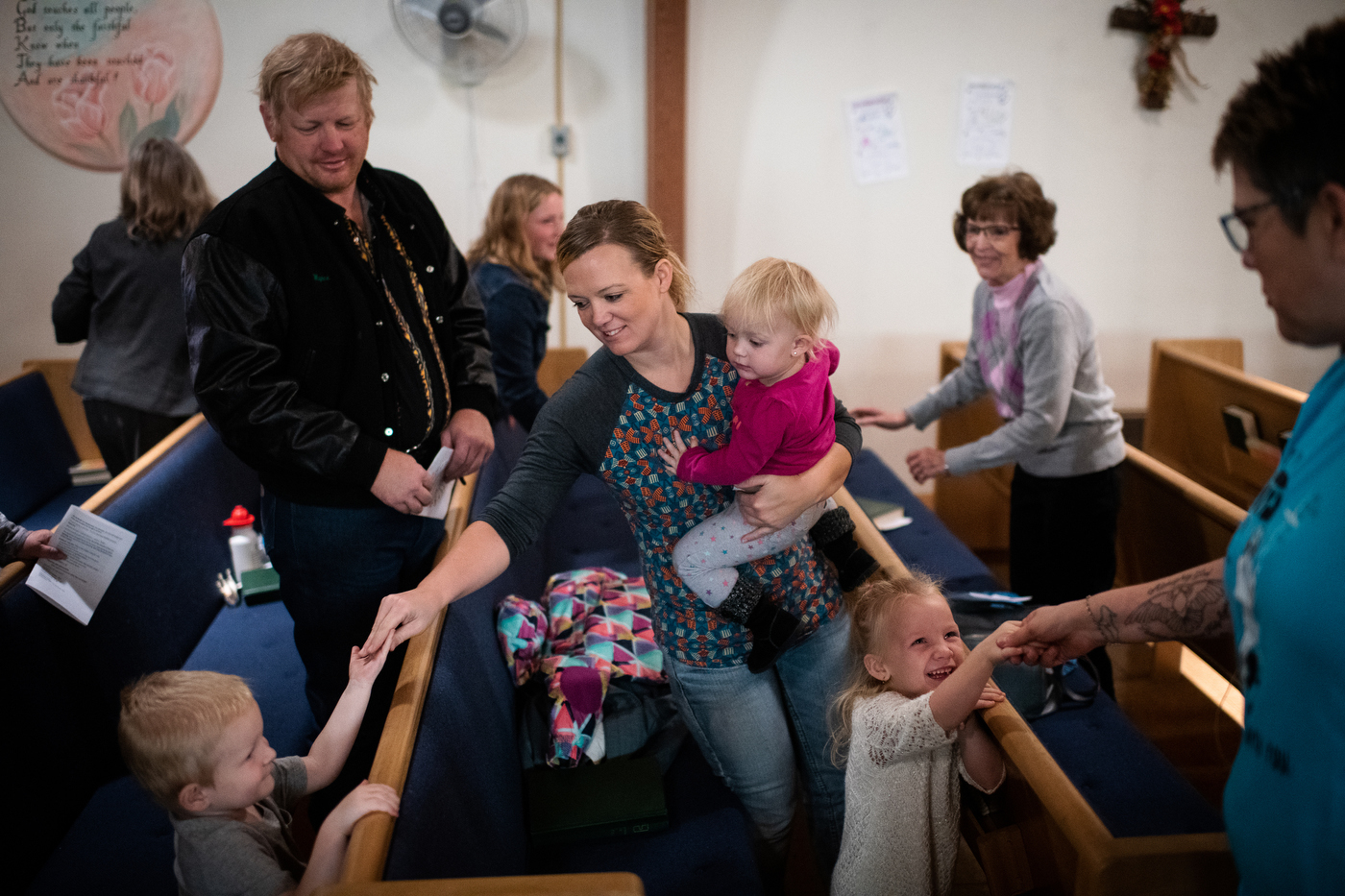  People share the peace during worship at American Lutheran Church, an ELCA church, in Bison, SD. 