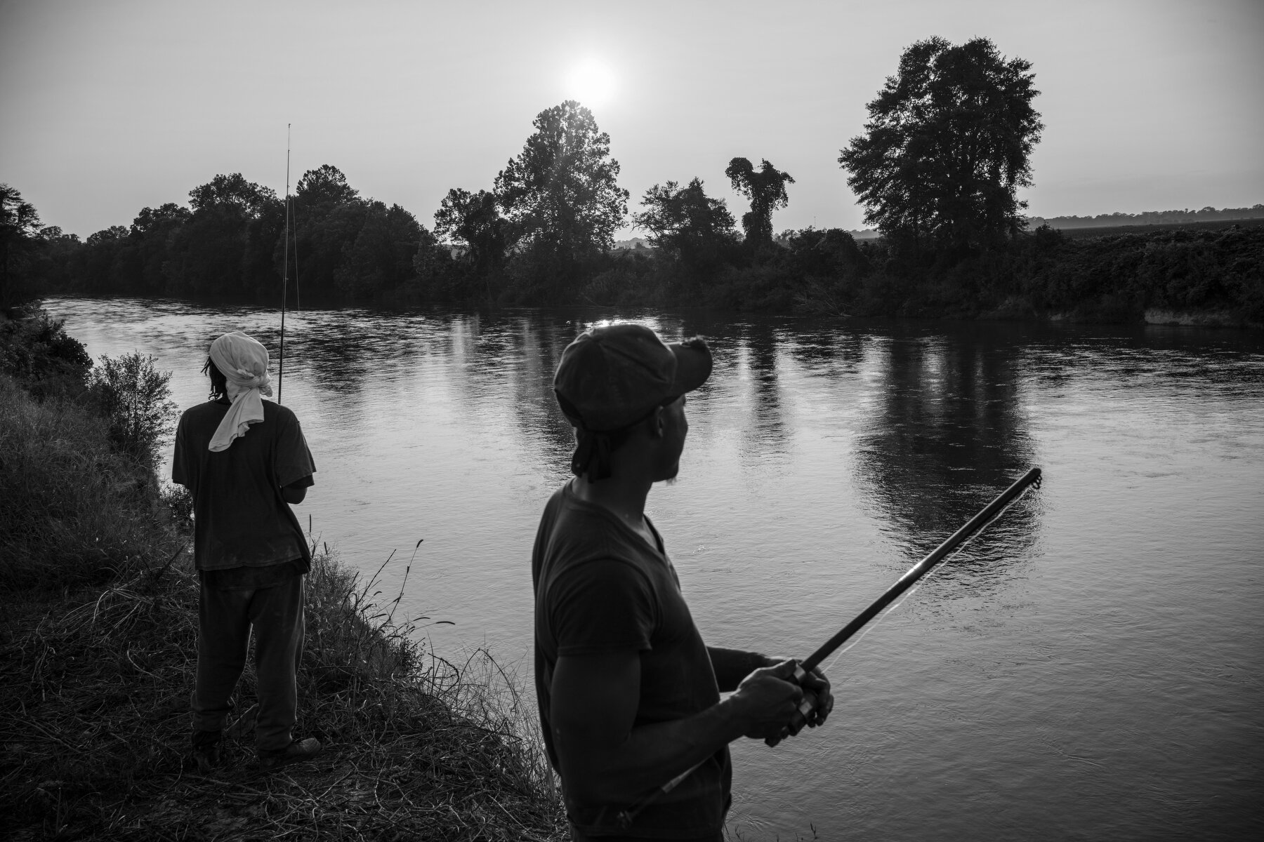  Jeffrey Taylor, left and Kenneth Rudd fish a branch of the Little Tallahatchie River in Enid, MS. 