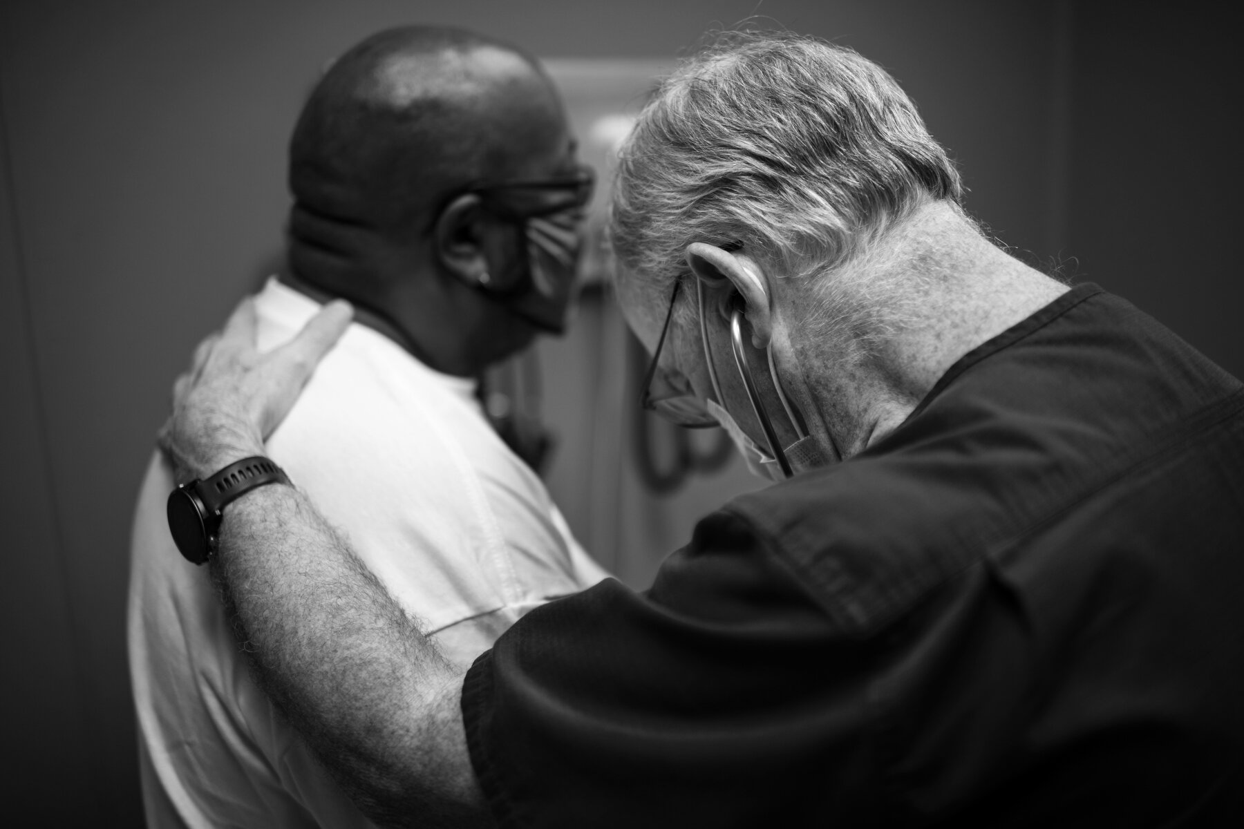  Dr. Richard Waller checks on the health of a patient, Thad Boyd, who came to the clinic with breathing, gastrointestinal, and sinus issues in addition to hypertension and other medical concerns that are overwhelmingly endemic in the area around Mark