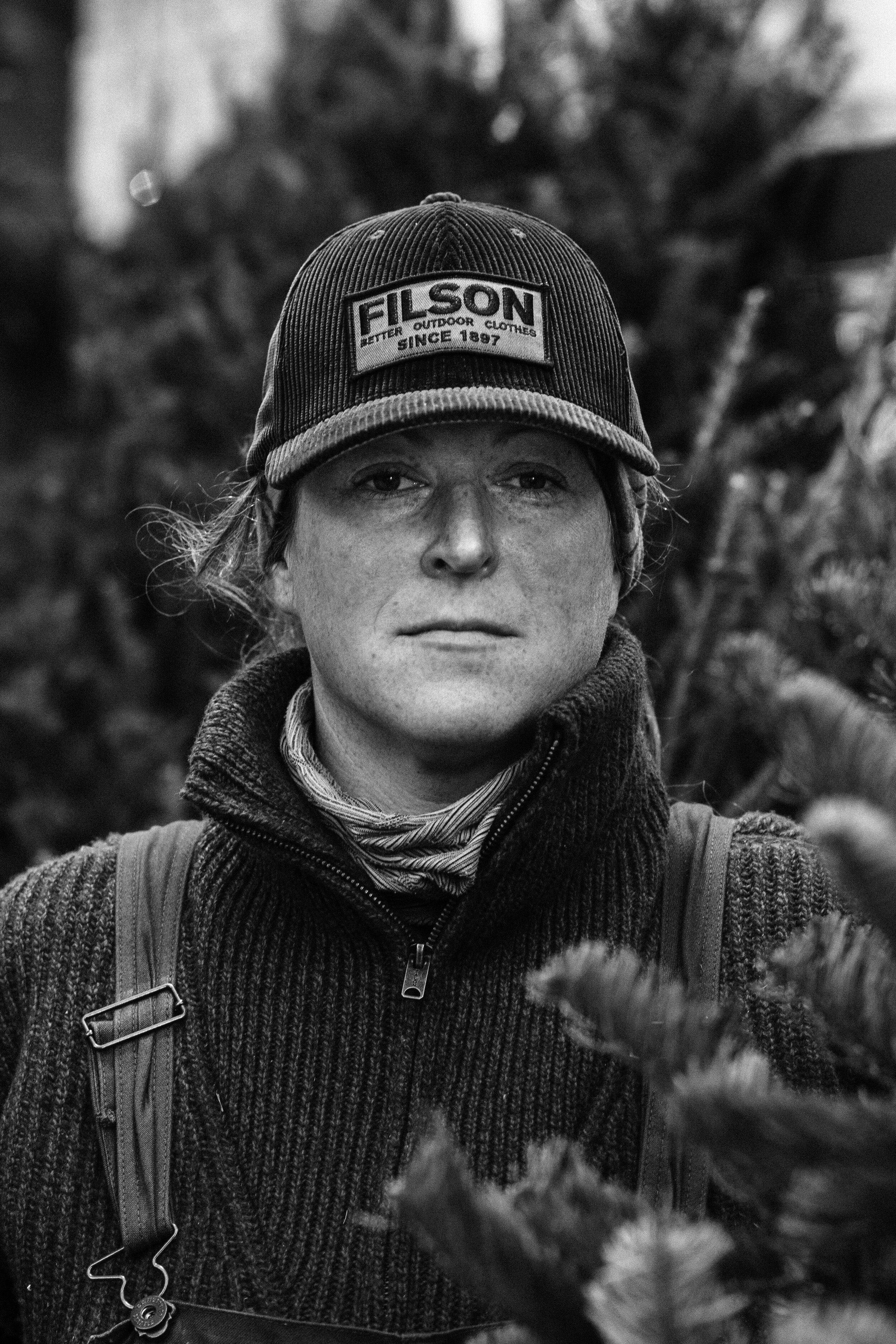  Emily Mullen, a Christmas tree merchant for Uptown Christmas Trees at their stand on 3rd Avenue and East 84th Street on the Upper East Side of Manhattan. 