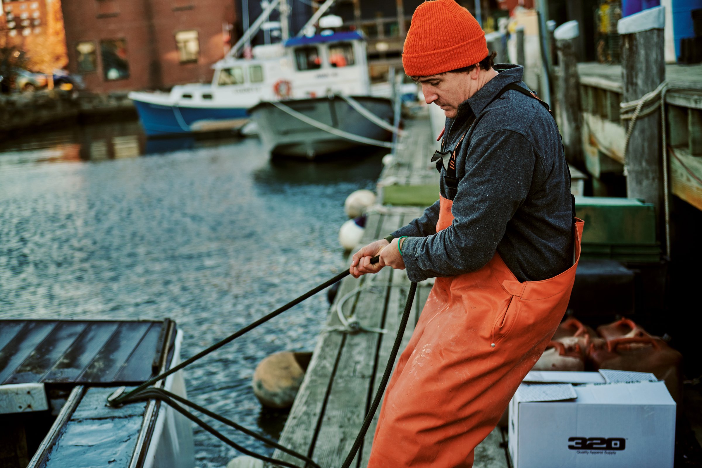  Taylor and Nikki Strout, owners of Rugged Seas, and Taylor’s father Frank Strout in Portland, Maine for Filson 