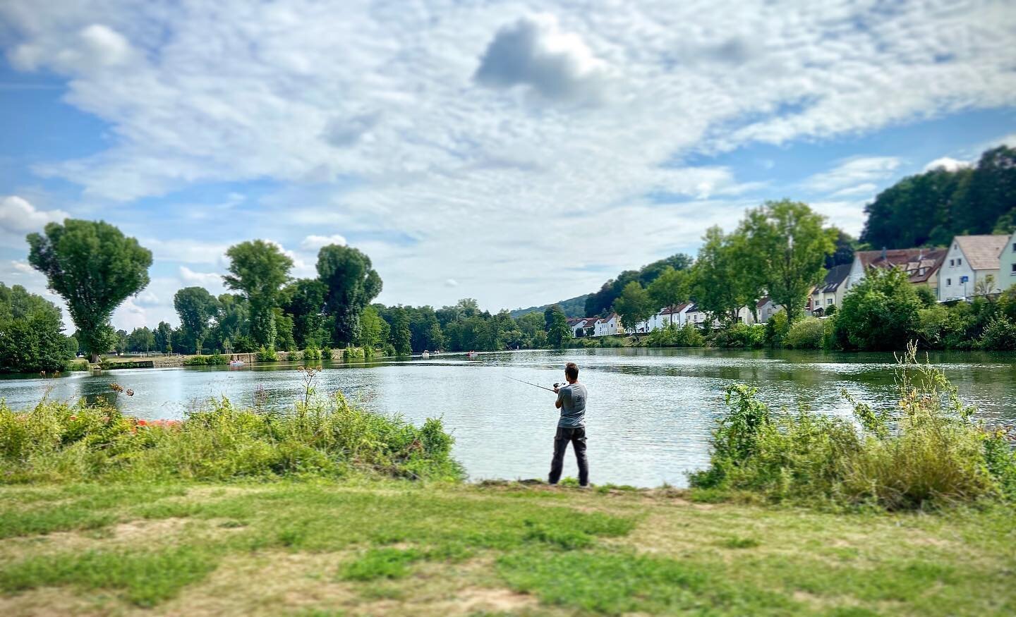 Throwback to few weeks ago, cycling the endless paths and green spaces around Bamberg, with a brief stop to take in the scenery and watch this weird dude simultaneously fish, smoke and yell at his dog (out of frame) every 3 seconds to stay put.
.
.
.
