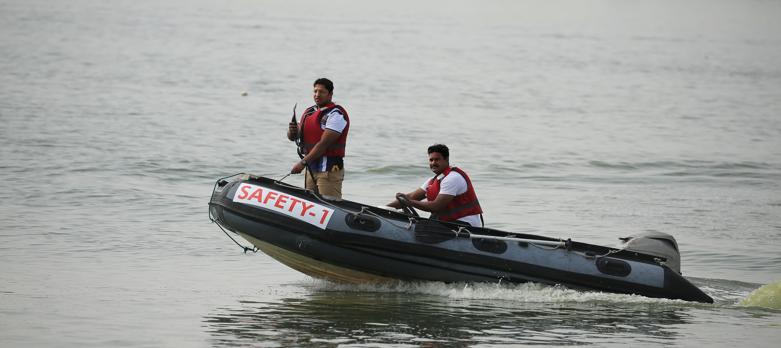 A Radio Equipped Safety Vessel with a trained Life Guard keeping a watchful eye