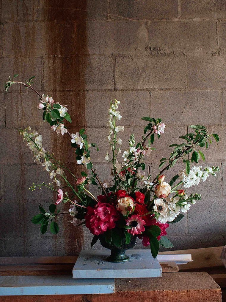 Eliza loves constructing grand arrangements, especially using large blossom branches foraged by the side of the road. In her own words they're 'a nod to that true flower of a woman, Constance Spry.' Photo: Eliza Rogers