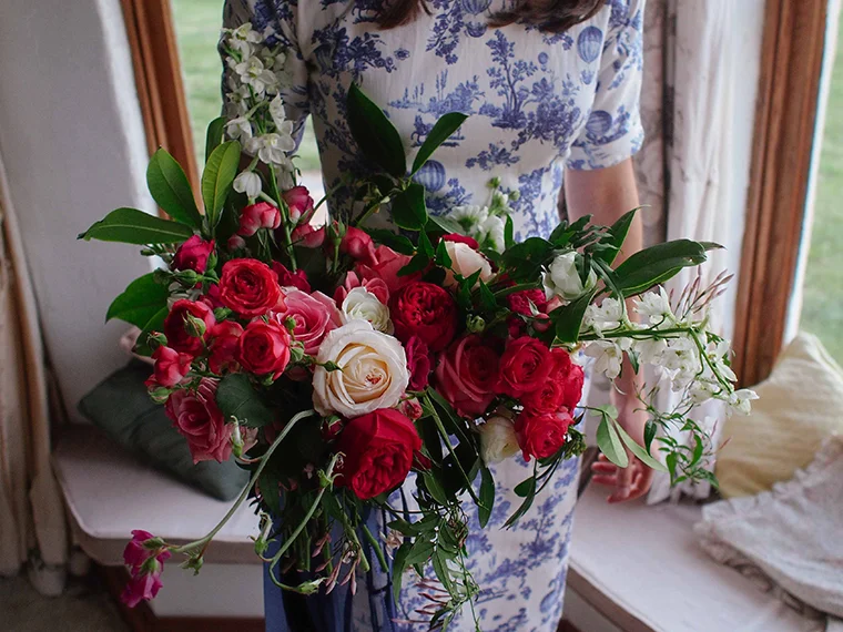 A romantic bridal bouquet featuring botanical elements taken from the client's own garden. Photo: Eliza Rogers